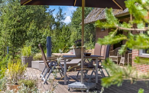 Kersta - 3.3Km from the Sea: Furniture, Chair, Outdoor Furniture, Shrub, Garden, Outdoor Table, Shade, Umbrella, Eco Hotel, Flowerpot