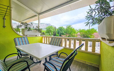Omiš 110: Table, Furniture, Property, Chair, Green, Building, Plant, Shade, Interior Design, Wood