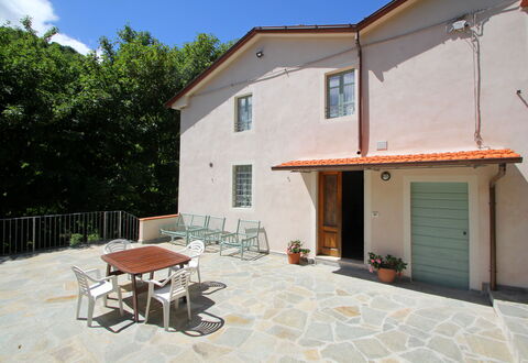 Apuane Retreat: Building, Property, Plant, Window, Table, Shade, Sky, House, Cottage, Wood