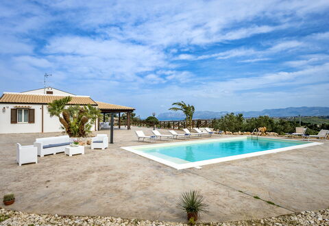 Villa Alcamo: Cloud, Water, Sky, Plant, Swimming Pool, Building, Azure, Tree, Shade, Arecales