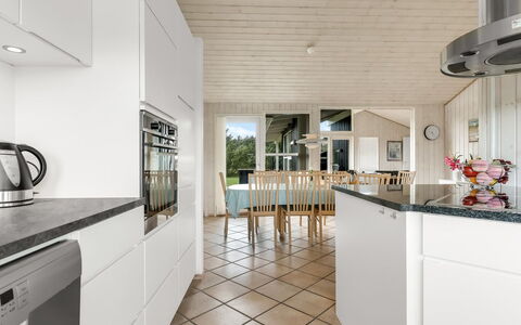 Juris - 950M from the Sea: Flooring, Kitchen, Floor, Interior Design, Wood, Countertop, Ceiling, Wood Flooring, Cabinetry, Kitchen Appliance