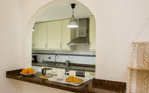 Golf & Mar: Tap, Cabinetry, Countertop, Plumbing Fixture, Sink, Wood, Floor, Exhaust Hood, Kitchen, Flooring