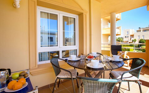 Golf & Mar: Table, Furniture, Property, Window, Chair, Interior Design, Wood, Architecture, Yellow, Floor