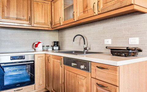 Villa Frane: Brown, Countertop, Cabinetry, Property, Furniture, Kitchen Sink, Building, Sink, Tap, Kitchen