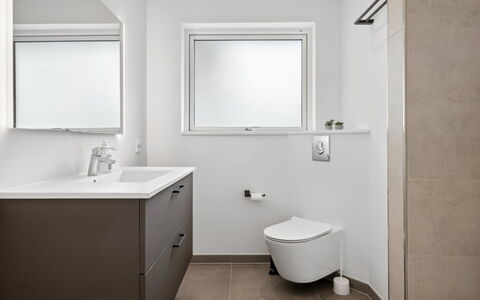 Norna - 350M from the Sea: Flooring, Plumbing Fixture, Floor, Interior Design, Bathroom, Toilet, Plumbing, Sink, Bathroom Cabinet, Tap