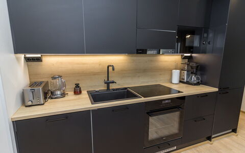 Casa Krogerus Ruka: Kitchen Appliance, Kitchen, Countertop, Major Appliance, Cabinetry, Interior Design, Flooring, Home Appliance, Furniture, Kitchen Stove