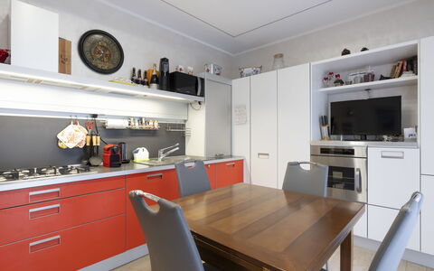 Bouganville: Table, Cabinetry, Countertop, Property, Furniture, Chair, Kitchen, Wood, Interior Design, Flooring