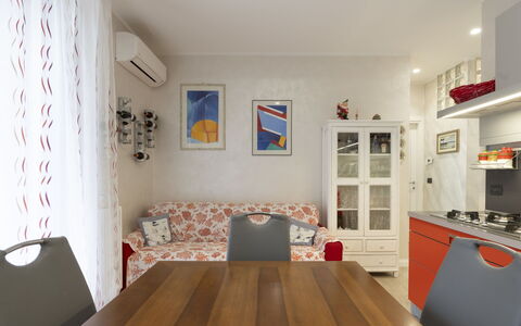 Bouganville: Furniture, Property, Table, Picture Frame, Cabinetry, Wood, Interior Design, Lighting, Living Room, Flooring