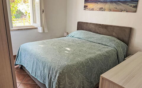 Porto Cervo 702: Bed, Furniture, Bedding, Bedroom, Floor, Bed Sheet, Interior Design, Flooring, Wood, Room