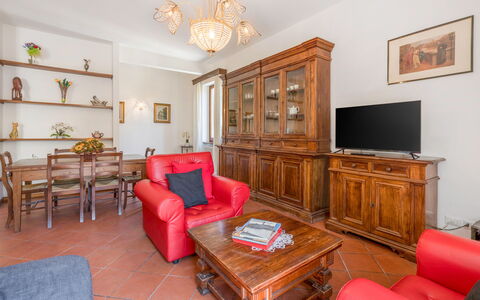 Cascine Apartment In Florence: Furniture, Interior Design, Flooring, Wood, Room, Floor, Ceiling, Living Room, Cabinetry, Lighting
