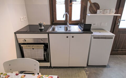 La Casetta: Cabinetry, Kitchen Sink, Countertop, Tap, Furniture, Window, Sink, Table, Kitchen, Plumbing Fixture