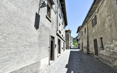 Erica Apartment: Sky, Road Surface, Window, Flooring, Building, Facade, Door, City, Alley, House