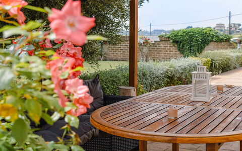 Cyca Holiday Home: Plant, Flower, Table, Furniture, Botany, Chair, Outdoor Furniture, Tree, Wood, Outdoor Table