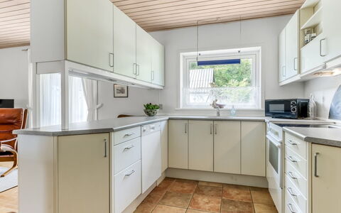 Gilbert - 500M from the Sea: Flooring, Kitchen, Interior Design, Countertop, Wood, Kitchen Appliance, Cabinetry, Ceiling, Floor, Major Appliance