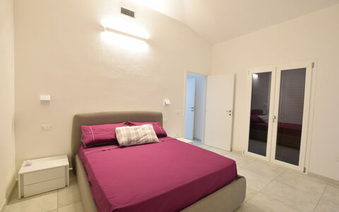 Villa Del Sole In Budoni Sea View: Furniture, Property, Comfort, Wood, Building, Bed, Door, Interior Design, Flooring