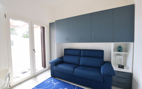Villa Del Sole In Budoni Sea View: Couch, Rectangle, Interior Design, Wood, Floor, Paint, Studio Couch, Real Estate, Shade, Living Room