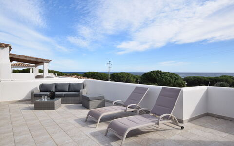 Villa Del Sole In Budoni Sea View: Cloud, Sky, Furniture, Shade, Interior Design, Outdoor Furniture, Building, Wood, Floor, Urban Design