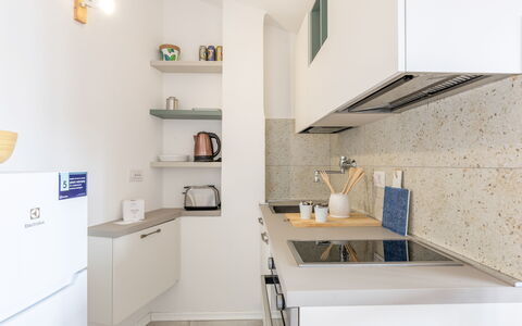 Conero Bluloft: Countertop, Kitchen, Kitchen Appliance, Interior Design, Cabinetry, Flooring, Wood, Furniture, Major Appliance, Kitchen Sink