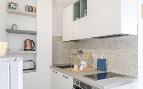 Conero Bluloft: Countertop, Kitchen, Kitchen Appliance, Interior Design, Cabinetry, Major Appliance, Flooring, Wood, Furniture, Room