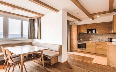 Superior mit 4 Schlafzimmern und Sauna 500.4: Table, Furniture, Window, Wood, Building, Lighting, Cabinetry, Interior Design, Flooring, Living Room