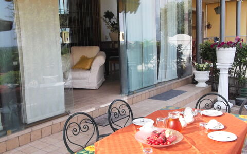 Villa Paradiso: Table, Tableware, Property, Furniture, Plant, Chair, Dishware, Wood, Interior Design, Lighting