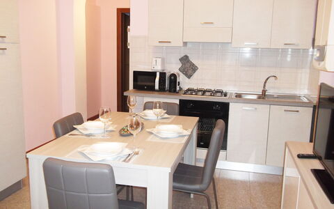 Casa Vacanze Sabrina: Kitchen Sink, Table, Property, Furniture, Sink, Cabinetry, Tap, Countertop, Chair, Kitchen