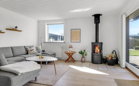Sulo - 300M from the Sea: Flooring, Furniture, Floor, Home, Living Room, Hearth, Wood-Burning Stove, Wood Flooring, Chair, Flowerpot