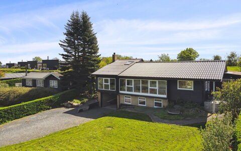 Sölvy - 300M from the Sea: Grass, Building, Window, House, Residential Area, Roof, Home, Shrub, Cottage, Land Lot