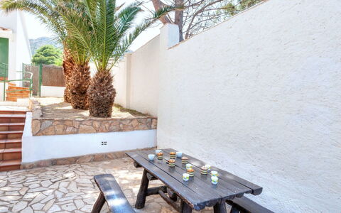 Don Quijote: Plant, Building, Table, Wood, Outdoor Furniture, Interior Design, Tree, Outdoor Table, Shade, Floor