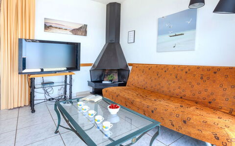 Don Quijote: Furniture, Couch, Table, Property, Comfort, Interior Design, Wood, Lighting, Living Room, House
