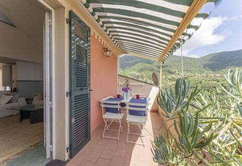 Emma House, Terrace and Sea View, Moneglia: Table, Plant, Furniture, Building, Chair, Shade, Cloud, Houseplant, Outdoor Furniture, Architecture