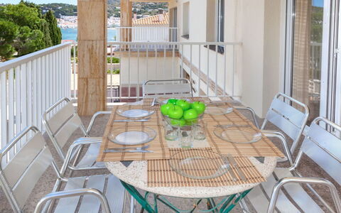 El Port de la Selva 101: Table, Furniture, Chair, Building, Wood, Porch, Outdoor Furniture, Interior Design, Window, Outdoor Table