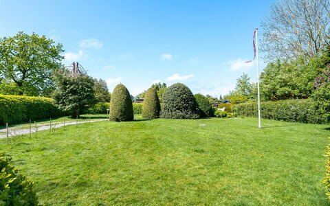 Tytti - 300M from the Sea: Vegetation, Shrub, Spring, Cottage, Garden, Shade, Backyard, Yard, Chair