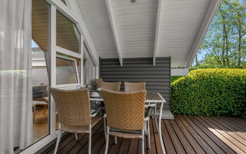 Tytti - 300M from the Sea: Vegetation, Shrub, Spring, Cottage, Garden, Shade, Backyard, Yard, Chair