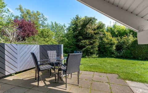 Tytti - 300M from the Sea: Vegetation, Shrub, Spring, Cottage, Garden, Shade, Backyard, Yard, Chair
