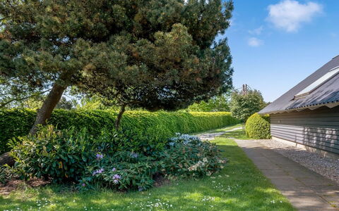 Tytti - 300M from the Sea: Vegetation, Shrub, Spring, Cottage, Garden, Shade, Backyard, Yard, Chair