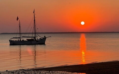 Eino - 150M from the Sea: Sky, Boat, Horizon, Afterglow, Watercraft, Sunset, Dusk, Sun, Orange