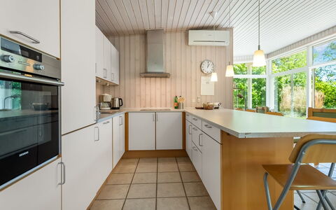Dagny - 100M from the Sea: Kitchen, Countertop, Kitchen Appliance, Interior Design, Flooring, Cabinetry, Wood, Ceiling, Floor, Light Fixture