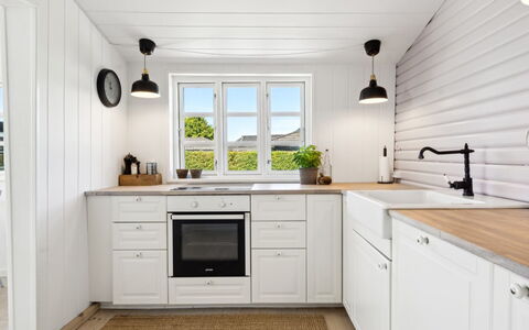 Kim - 250M from the Sea: Kitchen, Flooring, Wood, Cabinetry, Countertop, Interior Design, Floor, Furniture, Kitchen Appliance, Tap