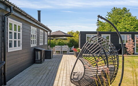 Kim - 250M from the Sea: Wood, Home, Furniture, Roof, Deck, Outdoor Furniture, Cottage, Door, Porch, Chair