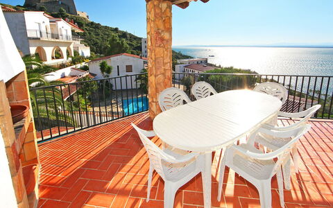 Joan Sarda: Sky, Water, Building, Property, Furniture, Plant, Wood, Seaside Resort, Chair, Table