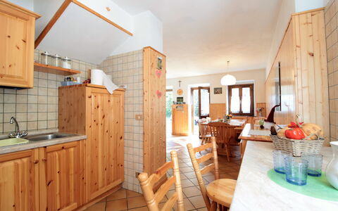 Baita a Pieve Tesino Mountain And Lake: Kitchen Sink, Furniture, Cabinetry, Window, Table, Building, Sink, Plant, Countertop, Lighting