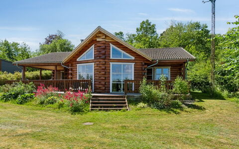 Lisbeth - 130M from the Sea: Wood, Roof, Architecture, Home, House, Cottage, Siding, Hardwood, Slope, Estate