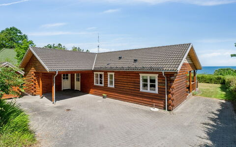 Lisbeth - 130M from the Sea: Wood, Roof, Architecture, Home, House, Cottage, Siding, Hardwood, Slope, Estate