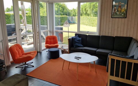 Gloria - 500M from the Sea: Furniture, Flooring, Interior Design, Floor, Wood, Chair, Table, Room, Living Room, Lighting
