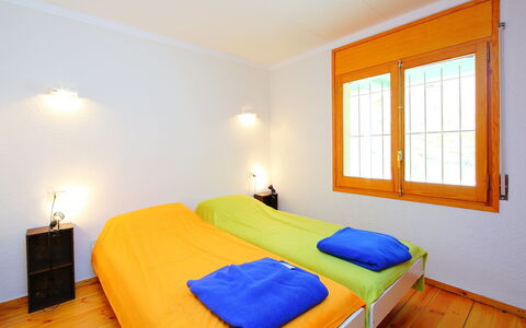 Roses 325: Bedroom, Bed, Room, Furniture, Property, Bed Sheet, Bed Frame, Interior Design, Yellow, Building
