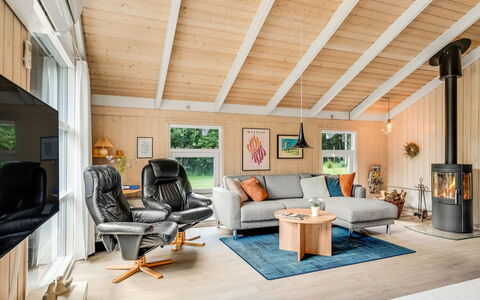 Amundi - 500M from the Sea: Furniture, Wood, Interior Design, Flooring, Ceiling, Couch, Living Room, Floor, Wood Flooring, Lighting