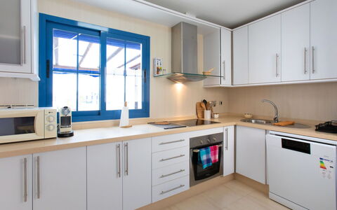 Ático Galera Playa Free Padel: Cabinetry, Countertop, Kitchen Sink, Sink, Tap, Kitchen Stove, Kitchen, Kitchen Appliance, Window, Wood