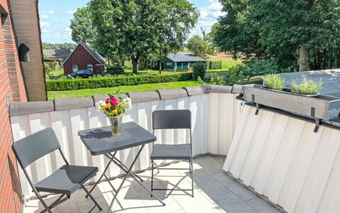 Winona: Furniture, Property, Plant, Chair, Building, Sky, Flower, Flowerpot, Shade, Table