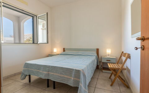 Andromeda Apartment In Gallipoli: Property, Furniture, Comfort, Window, Wood, Building, Textile, Bed, Flooring, Interior Design